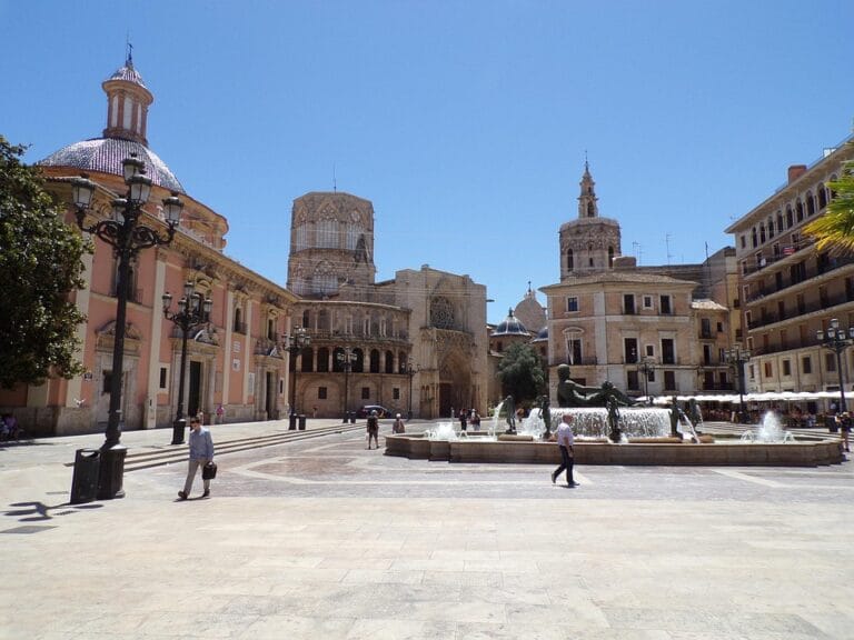 International students visiting Plaza de la Virgen with the Valencia Cathedral in Spain