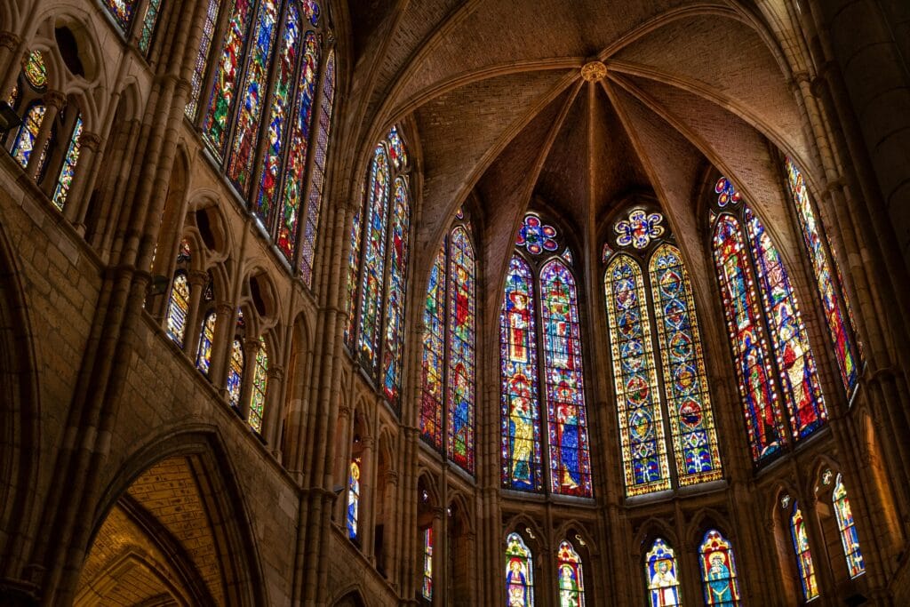Colorful stained glass windows of León Cathedral showcasing Gothic art
