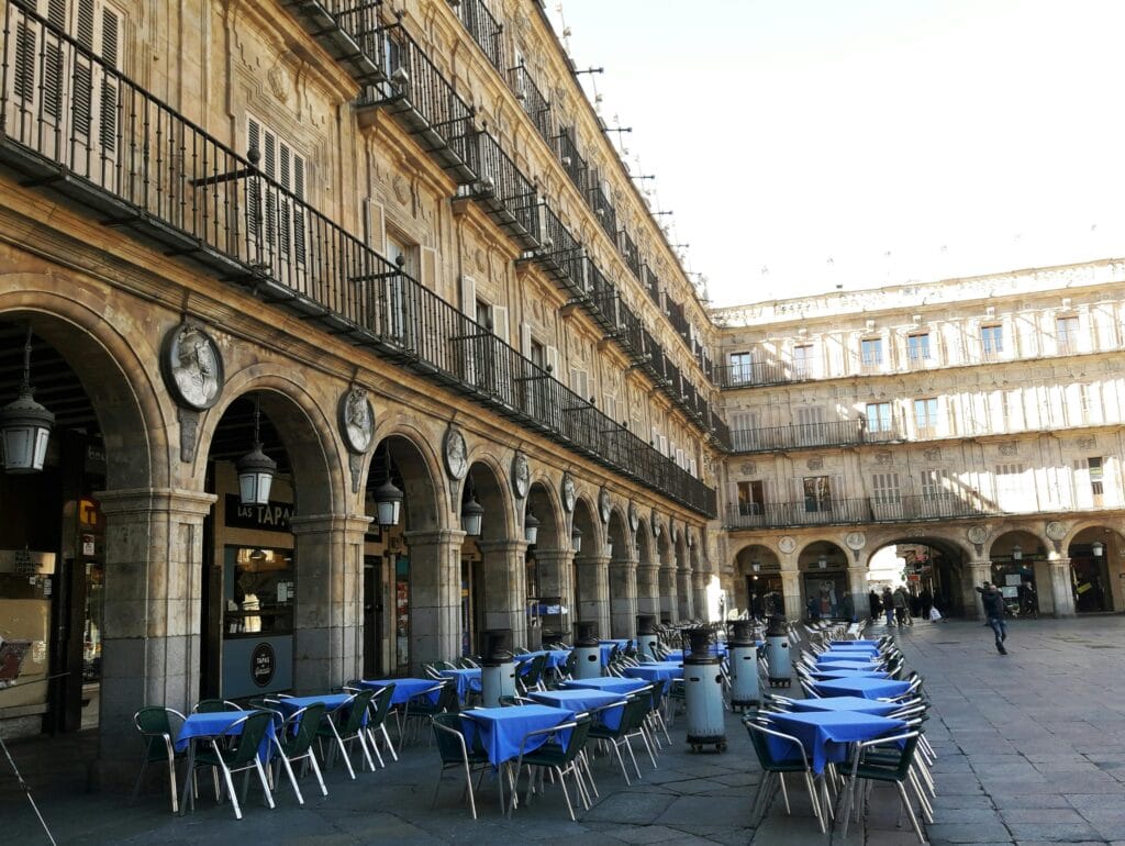 Terrace seating at Plaza Mayor in Salamanca, ideal for students to relax and socialize